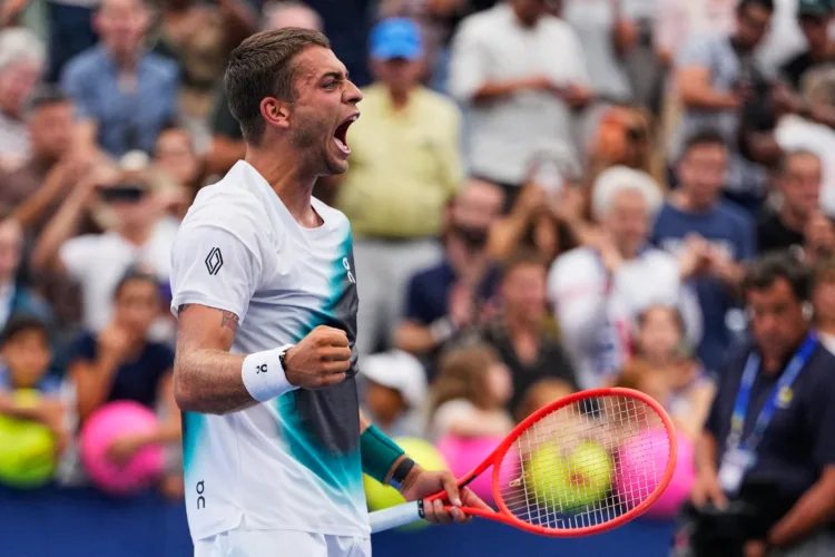 Cobolli rallies from two sets down at US Open